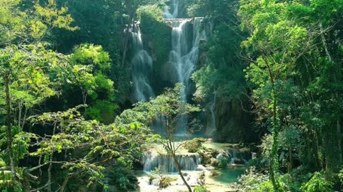 Kuang Si Falls #waterfalls #travelvlog #travelshorts