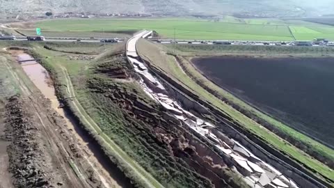 Drone footage shows massive earthquake cracks.