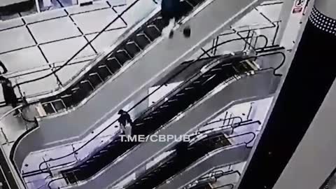 Insane Video of Someone Falling from a 4+ storey Escalator