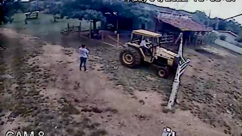 Grandfather Saves Child from Tractor's Wheel