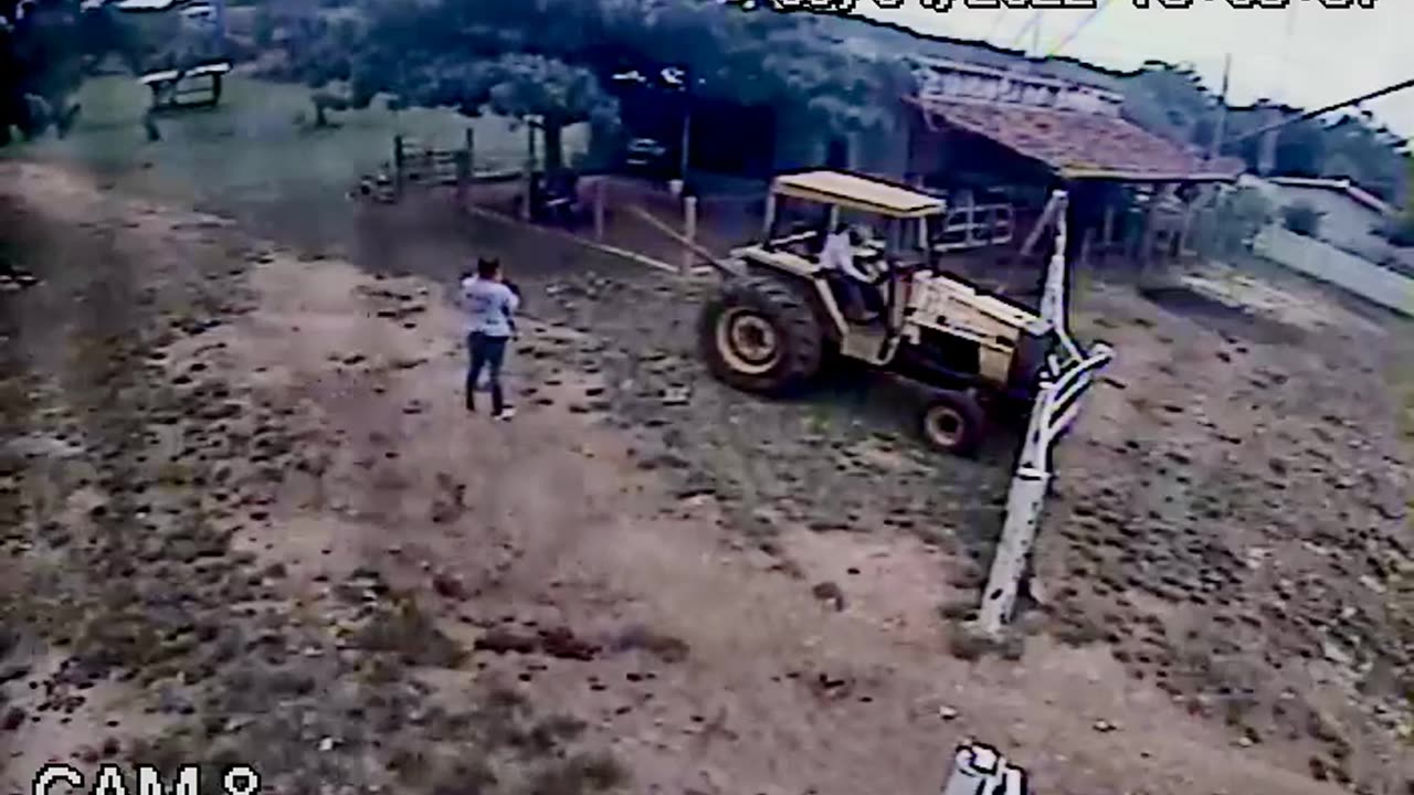 Grandfather Saves Child from Tractor's Wheel