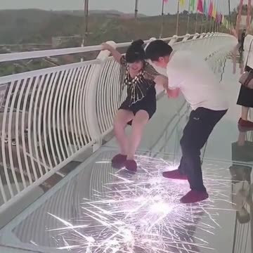 Laugh Out Loud: Tourists' Hilarious Reactions on China's Daring Glass Bridge"