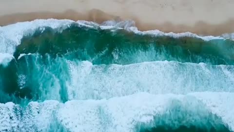 Strong Sea Waves Crashing The Rocky Shoreline