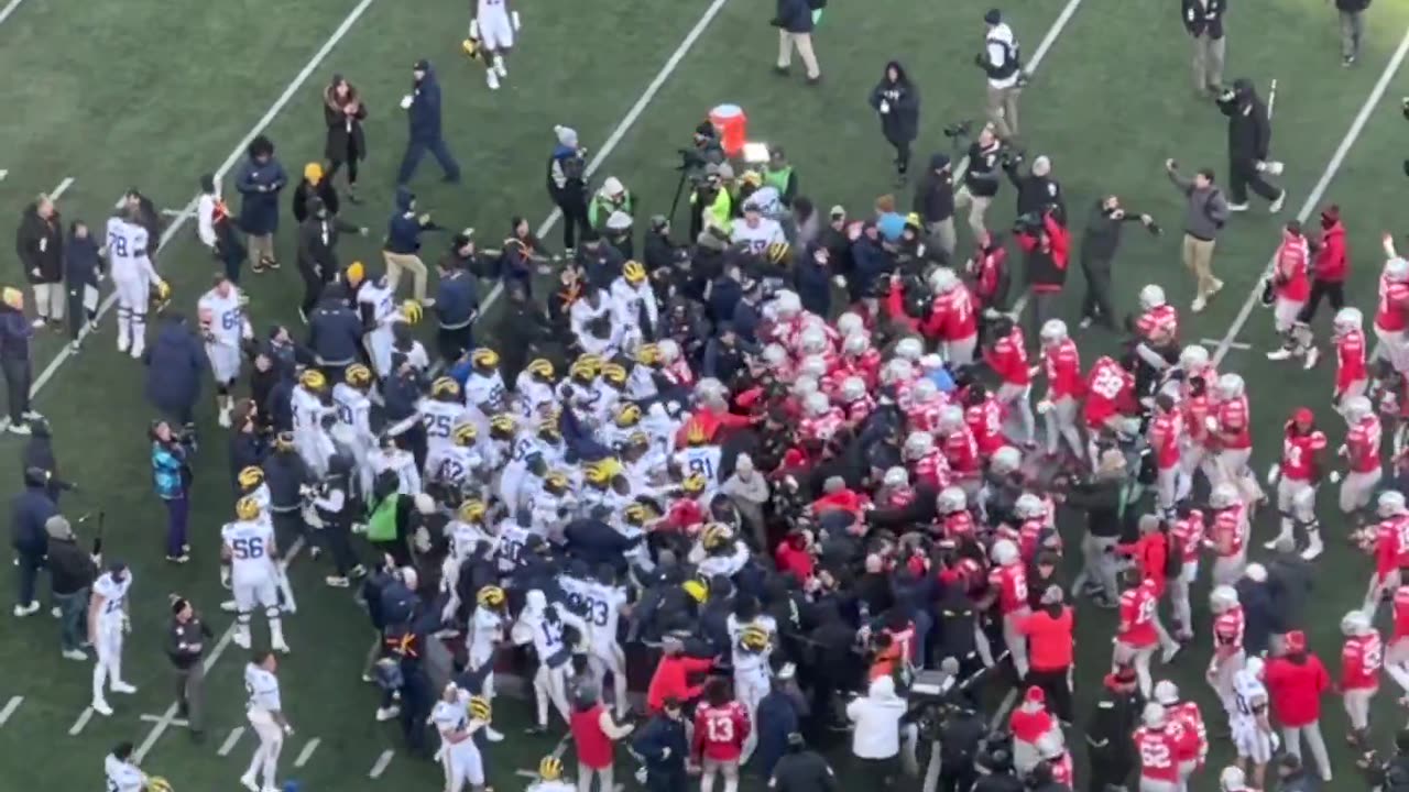 WATCH: All hell breaks loose after Michigan tried to plant flag midfield at Ohio State