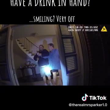 Why does Pelosi have a drink in his hand?