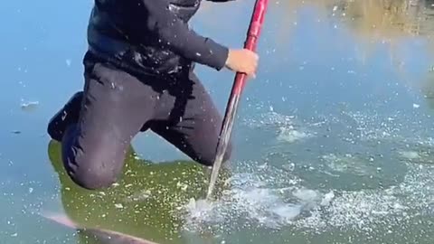 catching frozen river fish