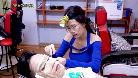 The blue dress suits her best at Seoul barber salon massage and ear cleaning