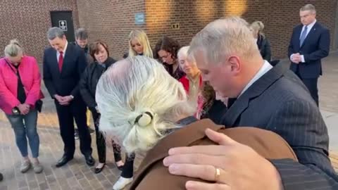 Catholic Leader Mark Houck Prays After Being Found Not Guilty