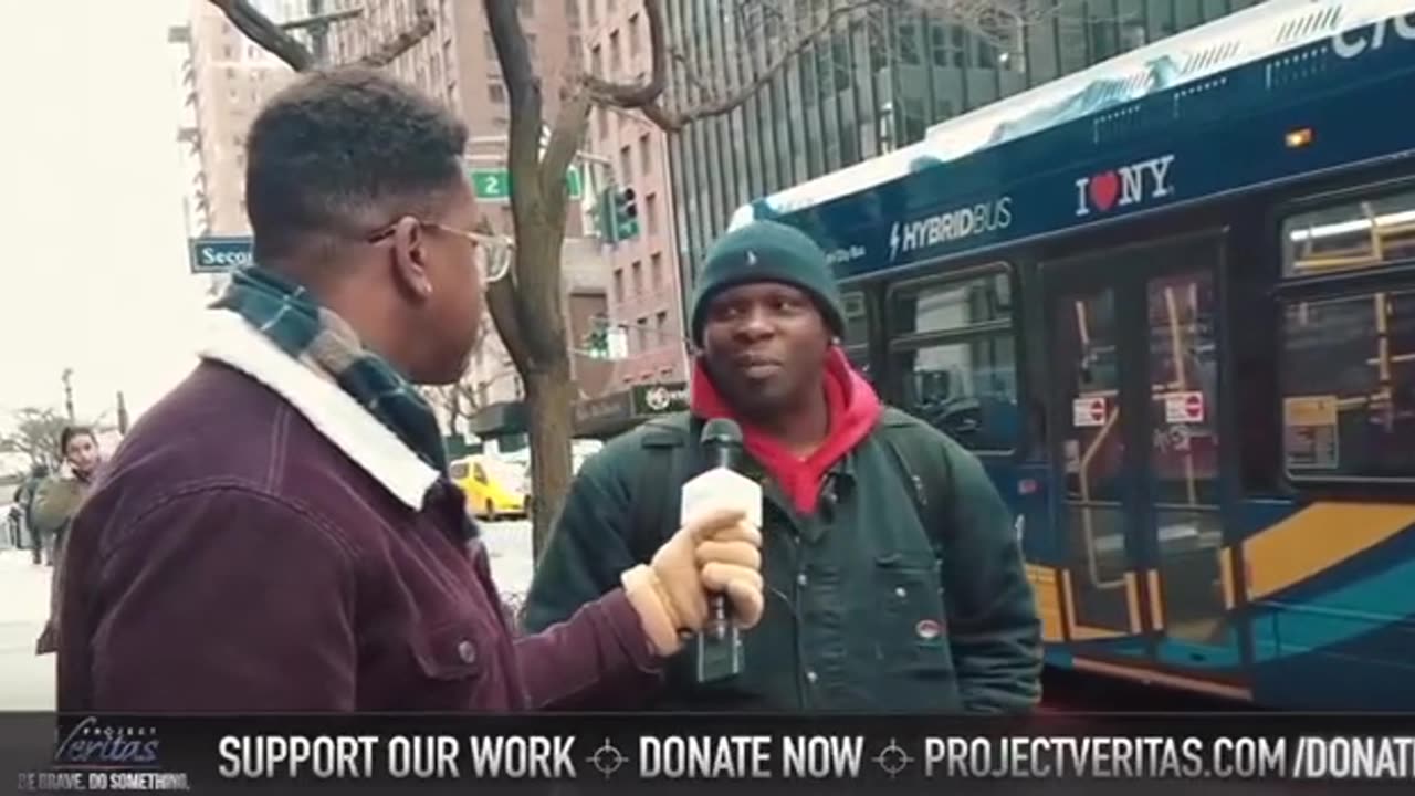 Project Veritas Talking to People Outside of Pfizer While the Exposé Plays on the LED Board Behind T