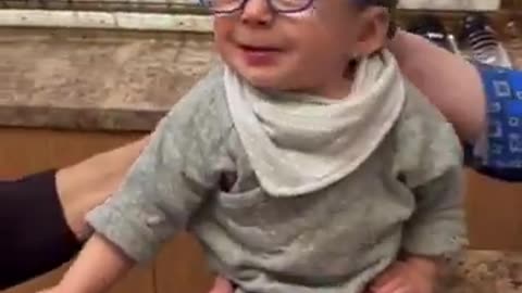 Baby sees clearly for the first time. Those facial expressions!