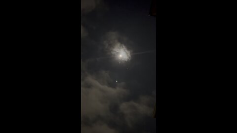 Clouds moving with moon