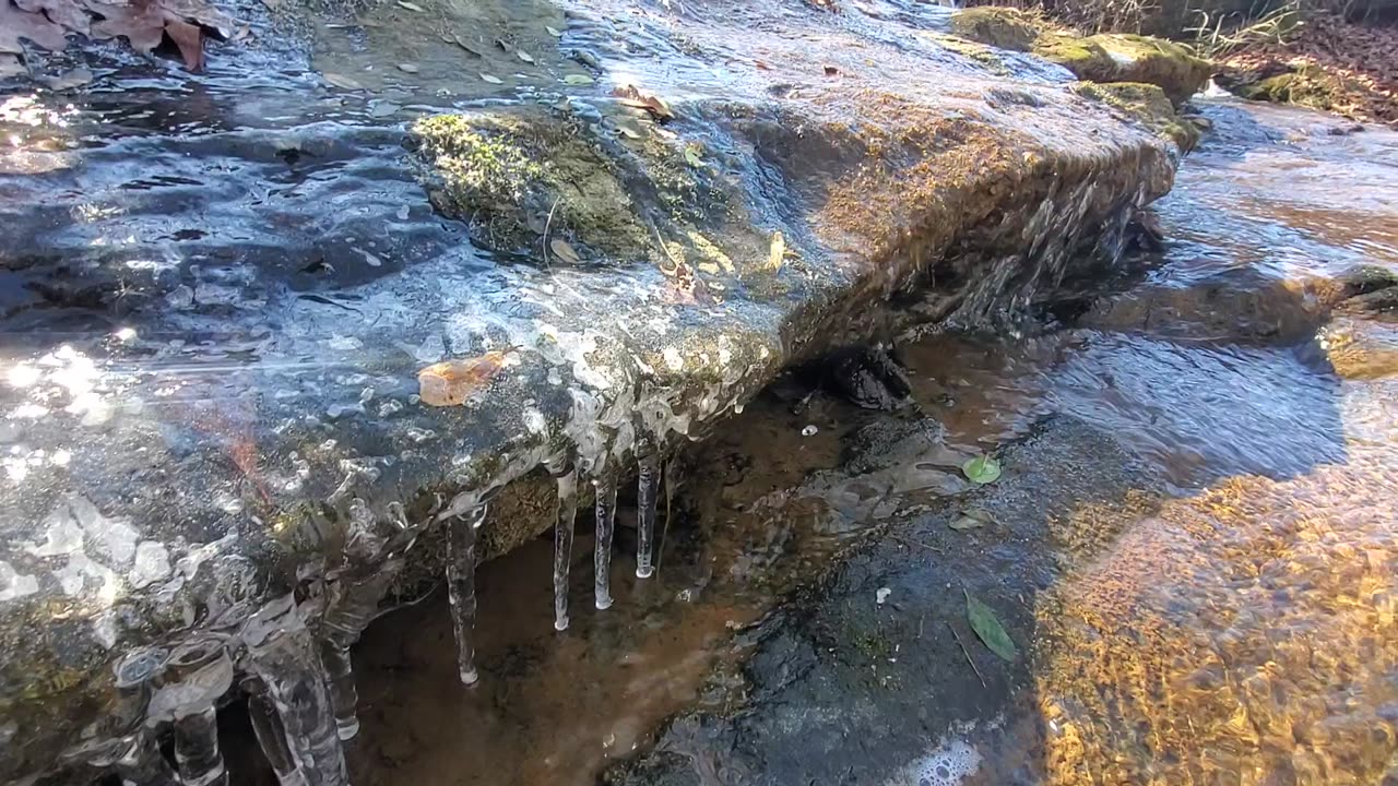 Sparkling Stream over Icicles