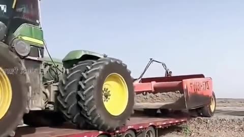 🚜 Epic Tractor Stunts: Lowboy Trailer Transport in Action! 🚛