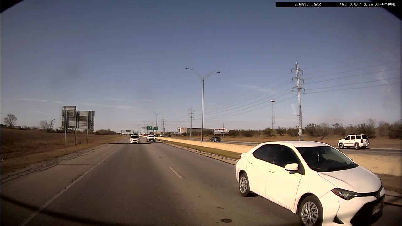 Driver Swerves To Avoid Trash Bag