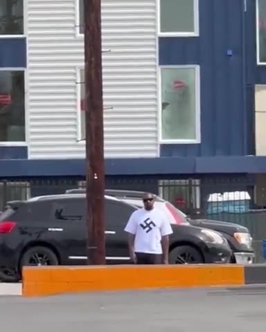Kanye West Spotted Wearing a Swastika T-Shirt