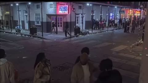 Brave New Orleans Police Officers run towards the chaos on Bourbon Street.
