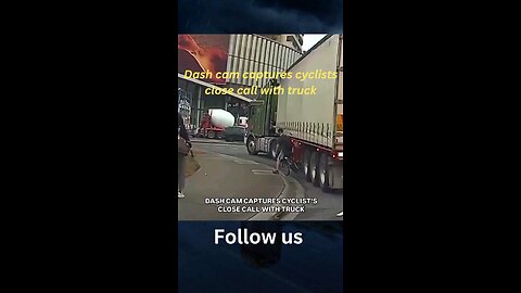 Dash cam captures cyclists close call with truck