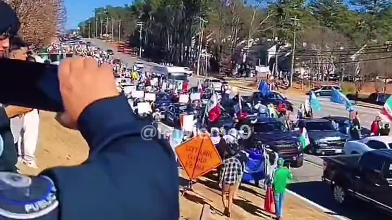 WATCH as pro-illegal immigration protesters waving foreign flags block traffic in Atlanta, GA.