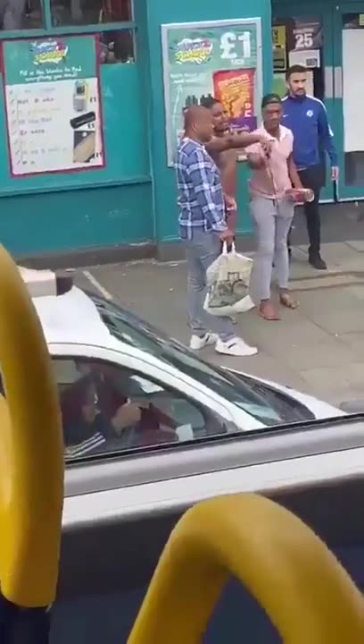 Obese african in his native loincloth swinging a sword around in public