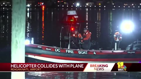 BREAKING PLANE AND HELICOPTER COLLIDE OVER POTOMAC RIVER IN DC