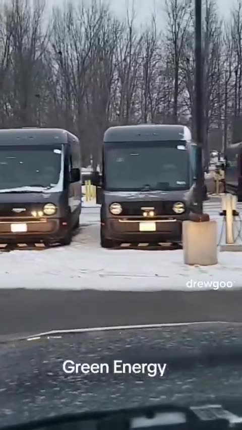 Amazon electric vehicles seen charging in the snow