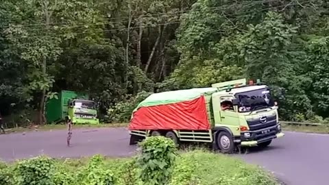 rescuing a truck loaded with boxes that had fallen into a ravine