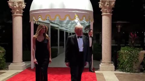 President Donald J. Trump and First Lady Melania Trump walk the red carpet at Mar-a-Lago on New Year's Eve.