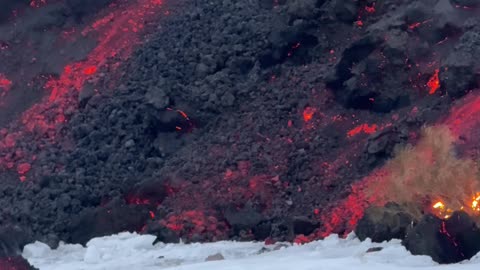 Skiing Next to the Mount Etna Lava Front