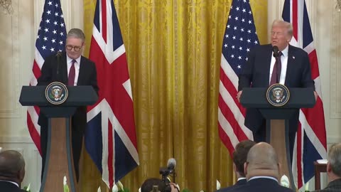 Trump smooching with the british prime sinister today