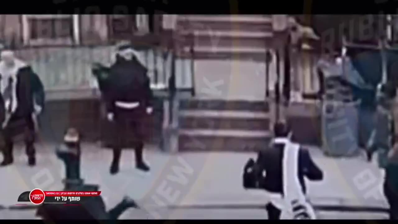 Two Chabad members who were marching on Shabbat afternoon wearing