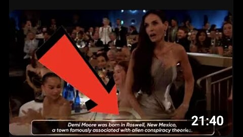 LOOK WHAT THEY PUT ON THE SCREEN AS DEMI MOORE WON AWARD FOR BEING "A WITCH ADDICTED TO RED SERUM!"