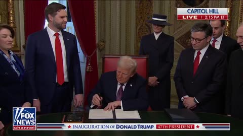 President Donald Trump signs the first executive orders of his term