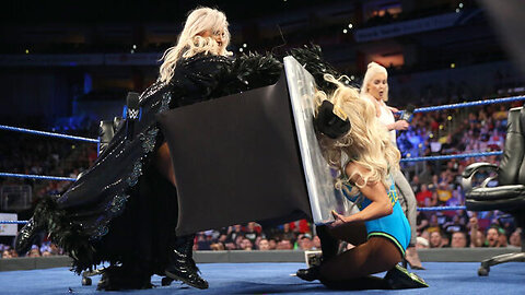 Charlotte Flair and Carmella sign the contract for their title match at Backlash: Apr 24, 2018 @WWE