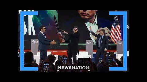 Elon Musk waves chainsaw while speaking at CPAC in DC