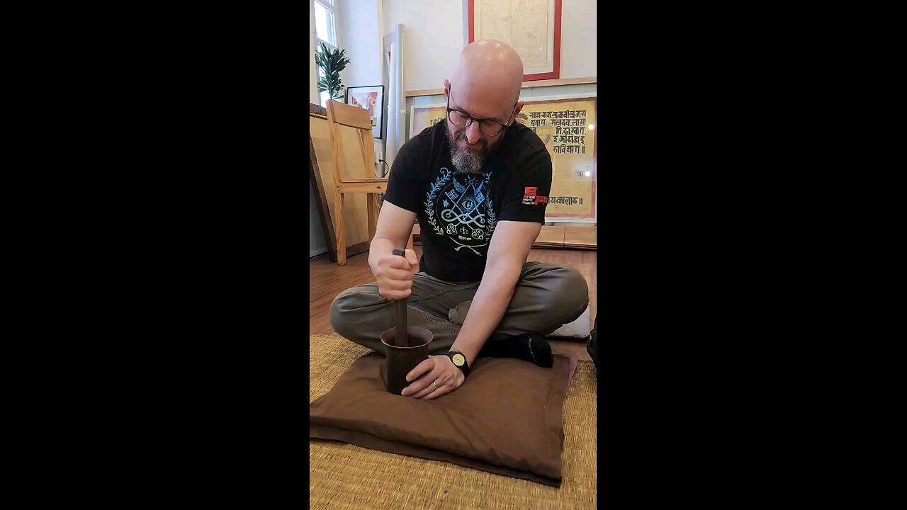 Pounding cinnabar in Nepal