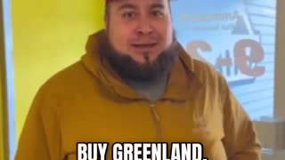 Greenland man throws on a MAGA hat and tells Donald Trump to buy the territory.