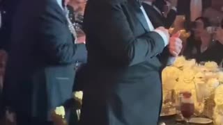 What do you notice in this video of Trump and Musk at last night’s New Year’s Eve party ?