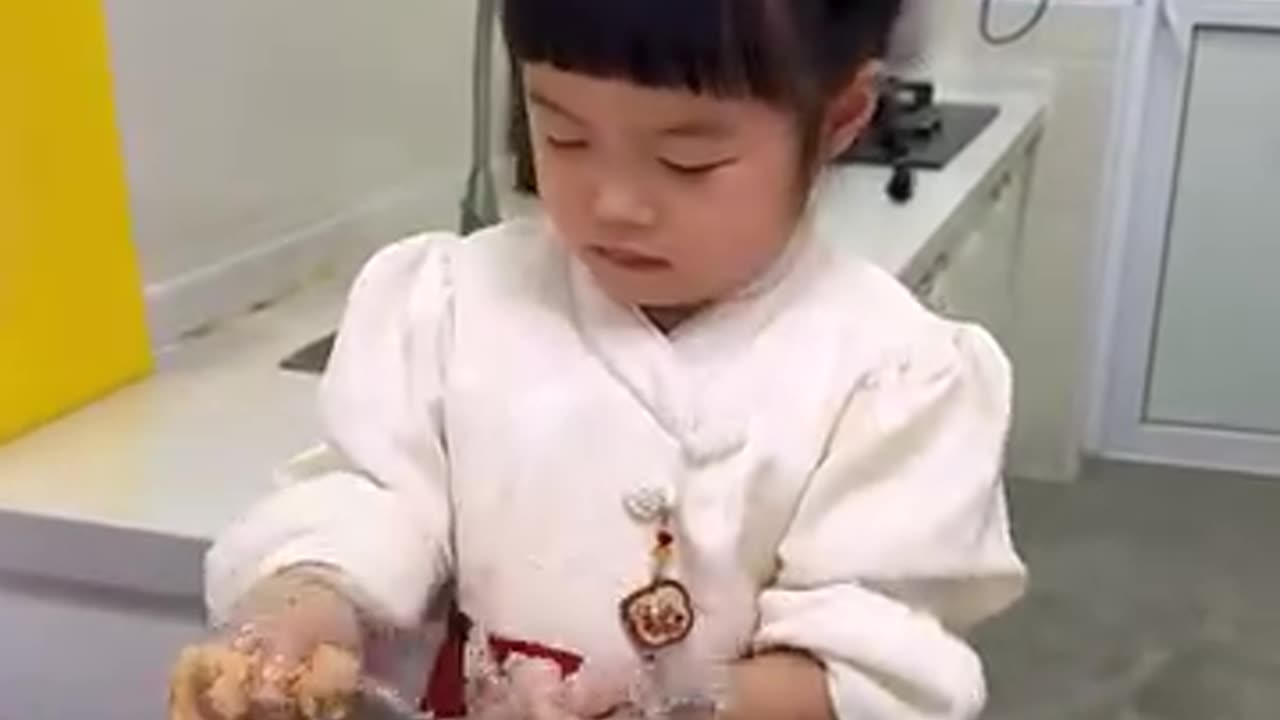 Have you seen a more adorable chef.