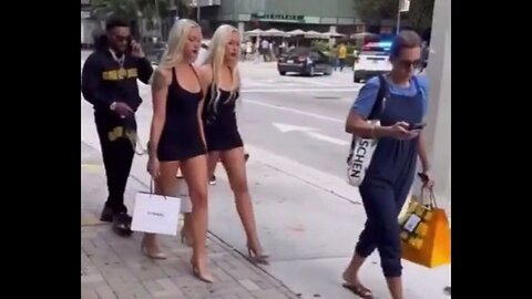 Man Spotted Walking Two Blonde Twins On A Leash In Miami