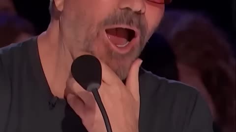 A man performs a fusion with the giant buffalo 🐃 on AGT