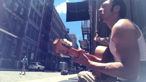 Store Manager Encourages Street Musician