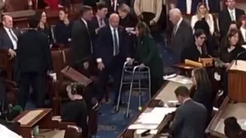 NANCY PELOSI ENTERS THE HOUSE CHAMBER USING A WALKER