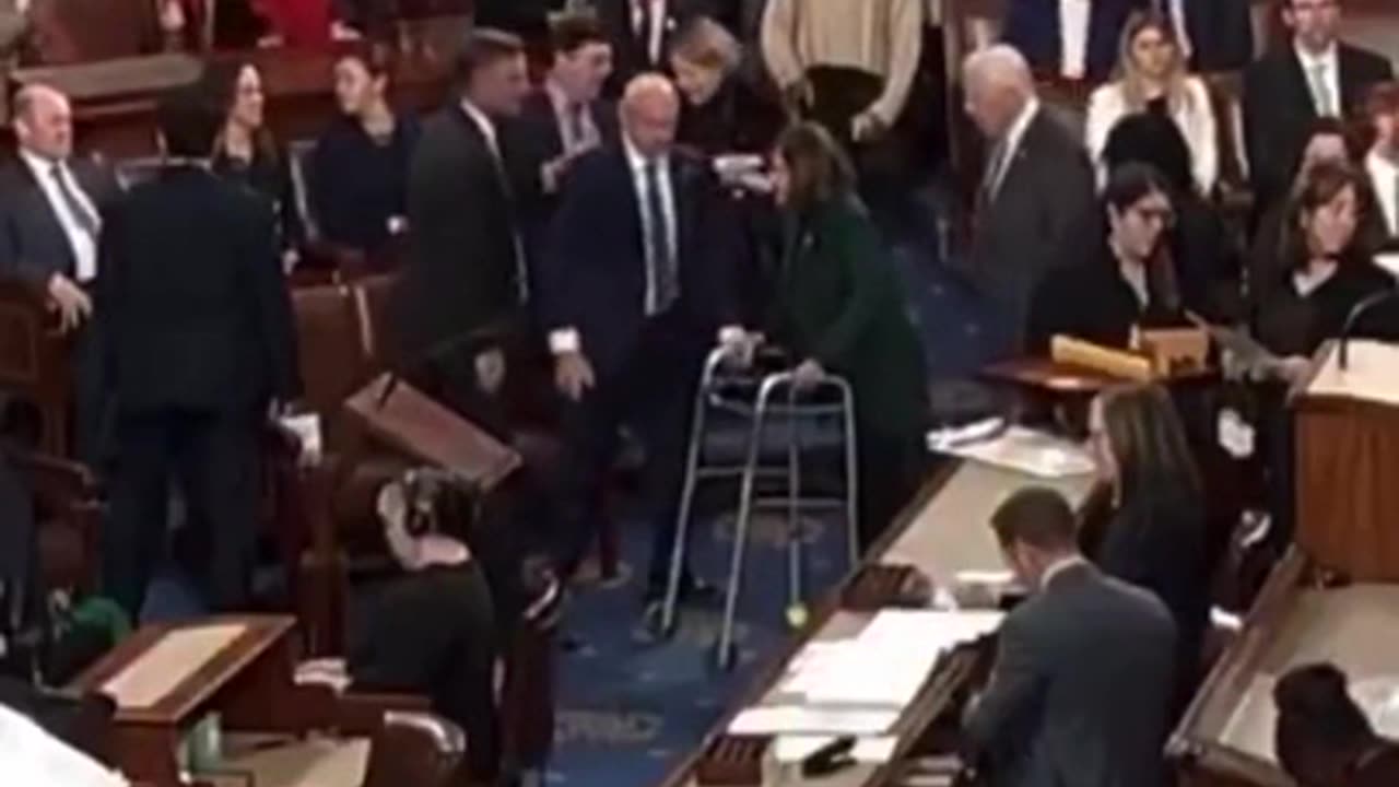 NANCY PELOSI ENTERS THE HOUSE CHAMBER USING A WALKER