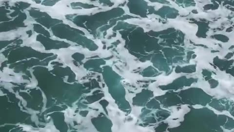 Drone captures moment boat carrying illegals gets flipped over by a wave in San Diego, California