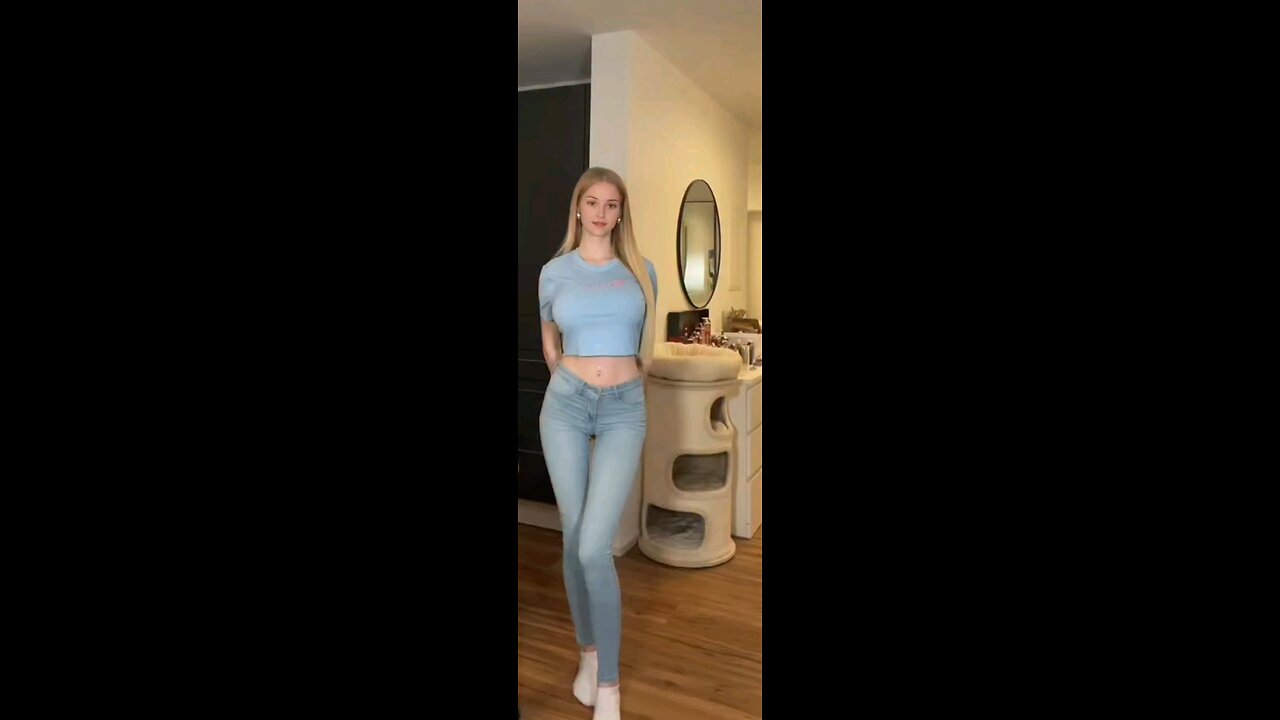 Tall Blonde in blue t-shirt