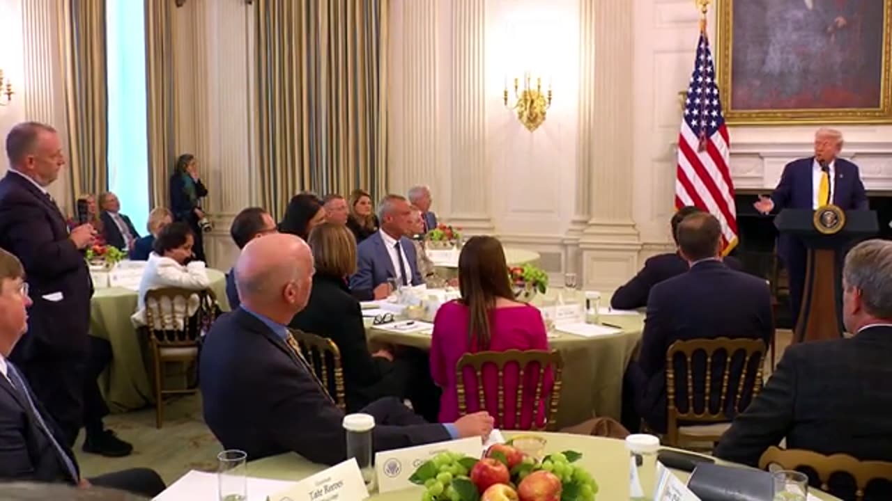 United States president Donald Trump talks to governors