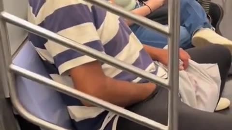 Muslim beating his meat on subway with people sitting next to him