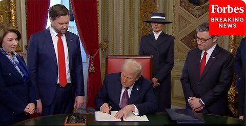 PRESIDENT DONALD TRUMP SIGNS HIS FIRST EXECUTIVE ORDERS AT THE CAPITOL