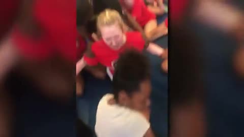 Cruel Black PE Coach and Two Black Girls Force a White girl into the splits until she cries.mp4