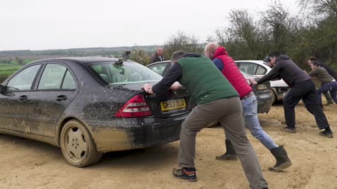 Epic Car Push Challenge: Who Rolls the Furthest?